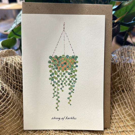 ‘String of Turtles’ Greetings Card