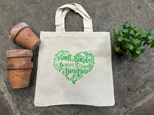 ‘To Plant a Garden’ Tote Bag